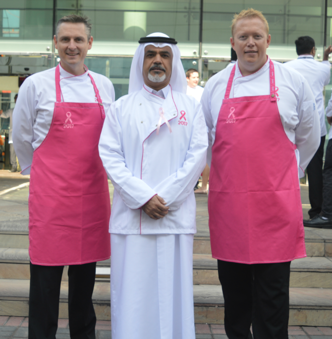 Emirates Flight Catering CEO, Saeed Mohammed with The Pink Brigade Founders; Chef Robbie Stokes and Chef Russell Impiazzi