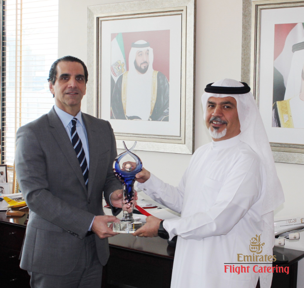 COO Faysal Moufarrej & CEO Saeed Mohammed displaying award